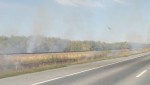 Огнеборцы потушили возгорание сухой травы возле железной дороги