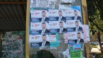 Кандидаты в депутаты обклеили остановки листовками