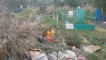 Могилу родственницы гайчан завалили мусором