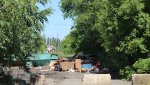 Промышленную заваливают мусором