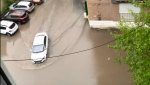 Дождевая вода затопила двор по ул.Ленина, 56А в Гае